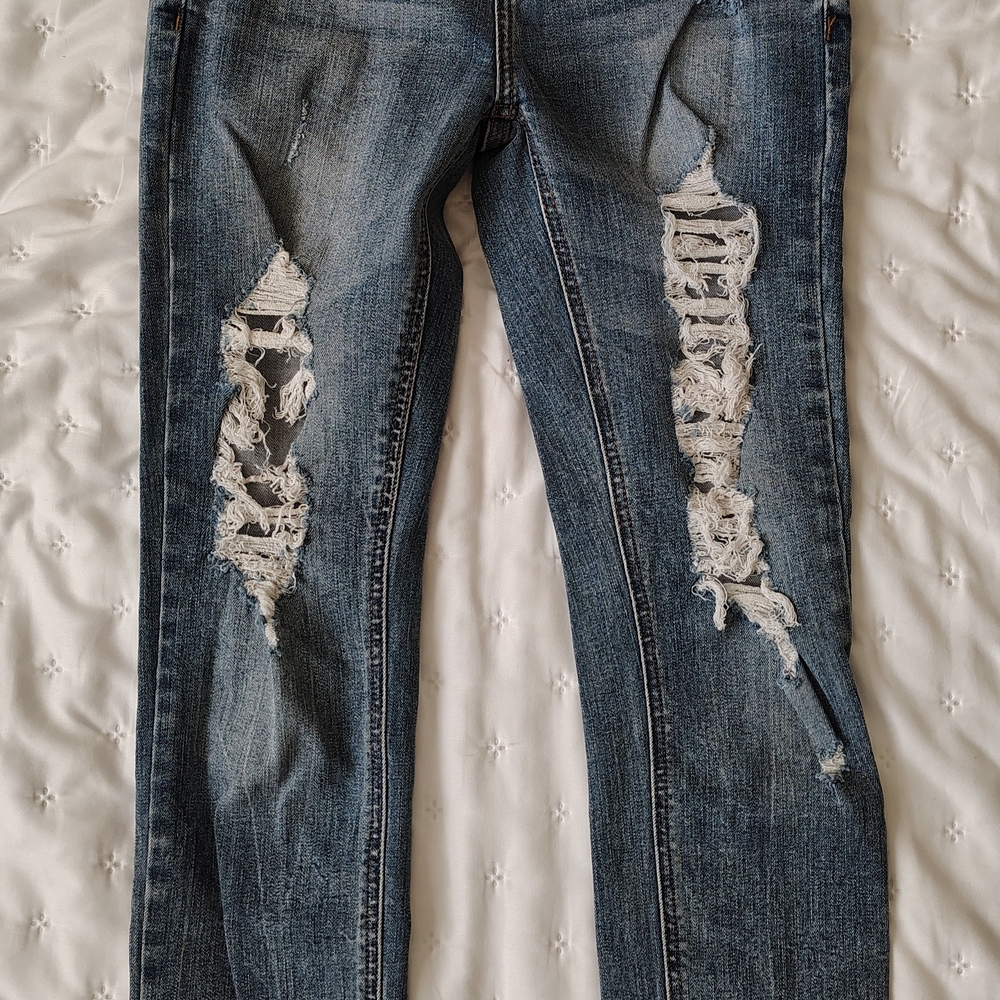 Distressed Blue Jeans